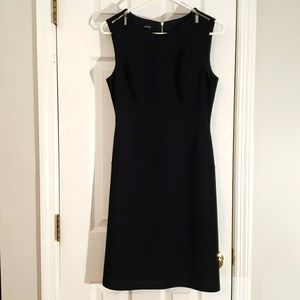 Classic black dress with silver hardware accents